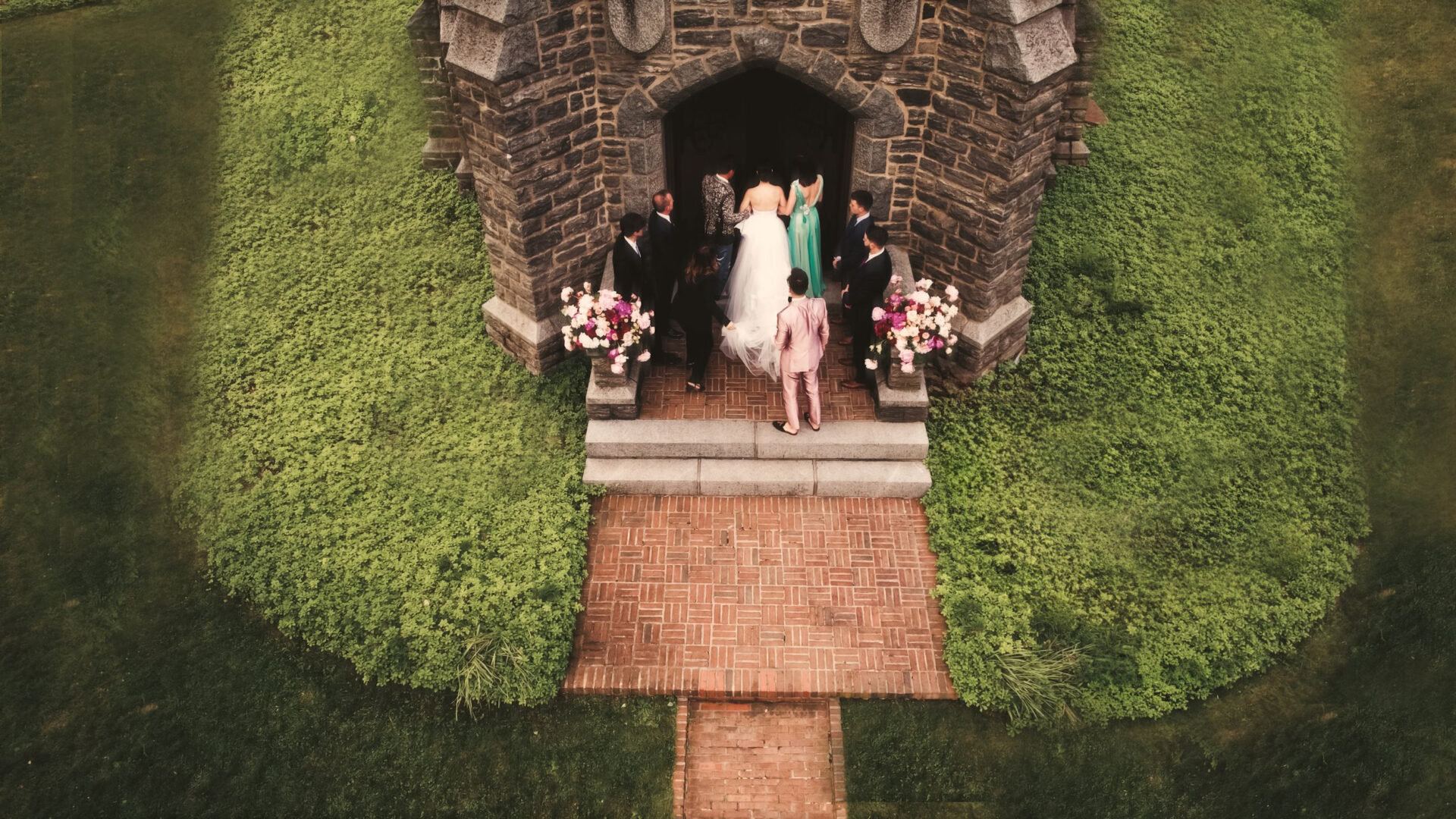 Drone exterior shot of bride entering church, Westchester NY