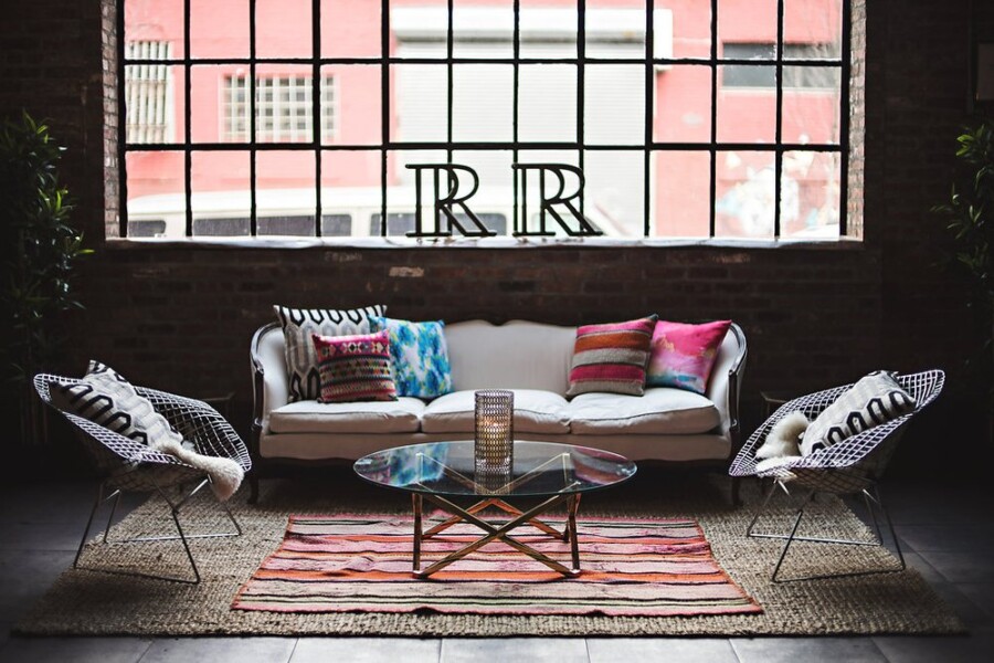 Sitting area in front of large window with R and R in window