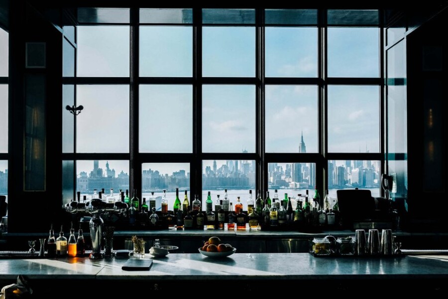 New York skyline viewed from bar with large window